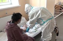 Madre con su hijo hospitalizado. Rusia 25/1/2022