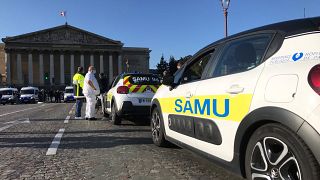 Members of France's medical emergency service Samu demonstrate outside the National Assembly
