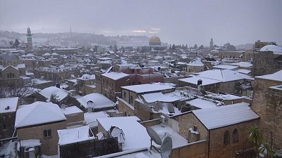 Old City of Jerusalem covered in snow.