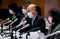 Lawyer Kenichi Ido speaks during a press conference in Tokyo on January 27, 2022.