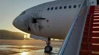 هواپیمای آسیب دیده در فرودگاه بغداد