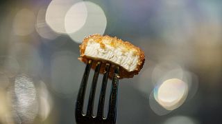 A nugget made from lab-grown chicken meat is seen during a media presentation in Singapore, the first country to allow the sale of cultivated meat.