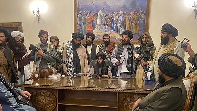 Taliban fighters take control of Afghan presidential palace in Kabul after President Ashraf Ghani fled the country. Taliban fighters take control of Afghan presidential palace in Kabul after President Ashraf Ghani fled the country.