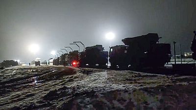 Russian military vehicles prepares to drive off a railway platforms after arrival in Belarus Russian military vehicles prepares to drive off a railway platforms after arrival in Belarus