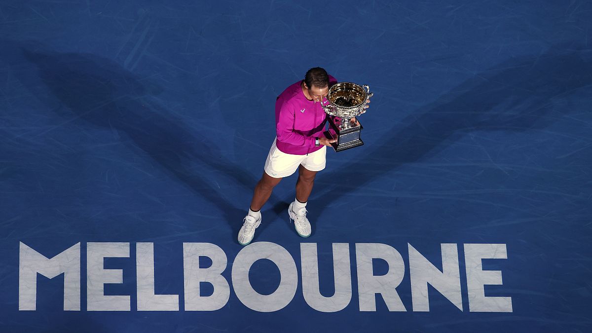 Rafael Nadal of Spain holds the Norman Brookes Challenge Cup after defeating Daniil Medvedev of Russia in the men's singles final at the Australian Open 