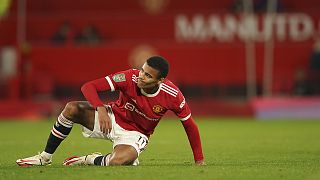 Manchester United's Mason Greenwood gets to his feet during the English League Cup soccer match between Manchester United and West Ham