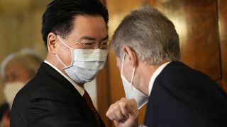 Speaker of the Czech Senate, Milos Vystrcil, right, welcomes Taiwan foreign minister Joseph Wu during his visit to Prague.