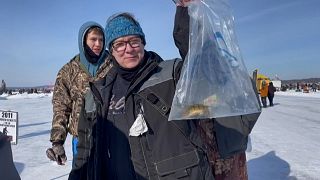 Nearly 10,000 anglers attend world's largest charitable ice fishing contest