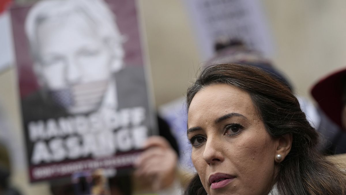 Julian Assange's partner Stella Moris, speaks outside the High Court after a hearing, in London, Monday, Jan. 24, 2022. 