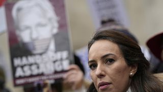 Julian Assange's partner Stella Moris, speaks outside the High Court after a hearing, in London, Monday, Jan. 24, 2022. 