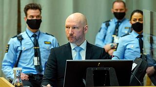 Convicted mass murderer Anders Behring Breivik sits in the makeshift courtroom in Skien prison on the second day of his parole hearing, Norway, Jan. 19, 2022.