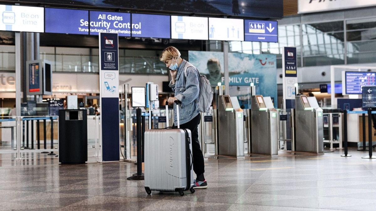 A passenger at Helsinki Airport. Finland's introduction of extra travel restrictions on 28 December did little to stem the spread of Omicron, new research shows.