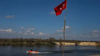 Turkish special forces on patrol along the Maritsa river near the Greek border