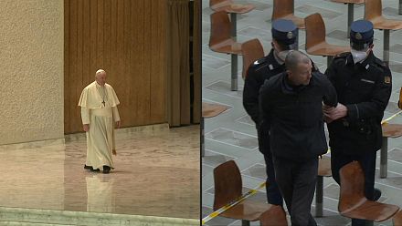 A shouting man denouncing the Church disrupts an audience by Pope Francis at the Vatican