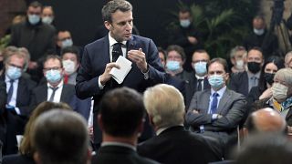 France's President Emmanuel Macron delivers a speech during a meeting, in Lievin, northern France, Wednesday, Feb. 2, 2022.
