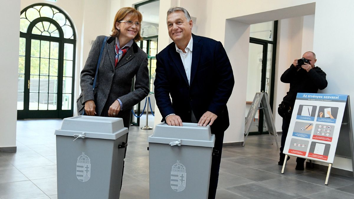Hungarian Prime Minister Viktor Orban and his wife, Aniko Levai cast their ballots at the nationwide local elections in Budapest, Oct. 13, 2019.