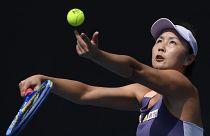 China's Peng Shuai serves to Japan's Nao Hibino during their first round singles match at the Australian Open tennis championship in Melbourne, Australia, on Jan. 21, 2020. 