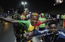 Senegal fans in Dakar celebrate their team's victory against Egypt in the African Cup of Nations soccer final played in Yaounde, Cameroon on Sunday, Feb. 6, 2022.