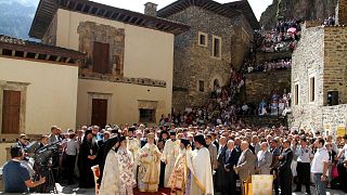 Hundreds attend the annual Virgin Mary service at the Sumela Monastery looking over the Black Sea 