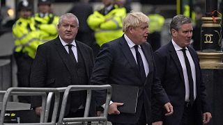 UK PM Boris Johnson and Labour leader Keir Starmer arrive for a remembrance service for British MP David Amess at St Margaret's Church, Westminster, London, Oct.18, 2021.