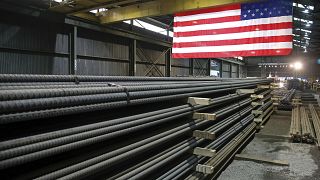 In this May 9, 2019, photo, steel rods produced at the Gerdau Ameristeel mill in St. Paul, Minn. await shipment.