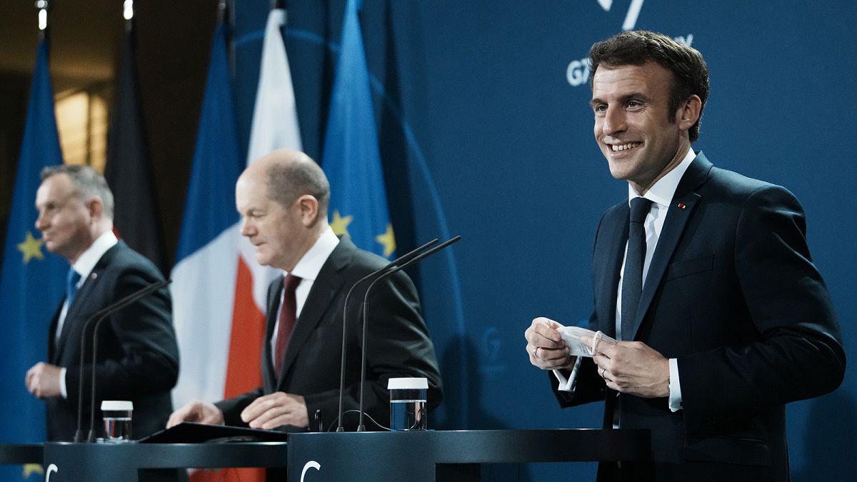 German Chancellor Olaf Scholz, Polish President Andrzej Duda and French President Emmanuel Macron attend a joint press conference in Berlin, 8 February 2022