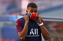 Kylian Mbappe wearing his mask before a Paris St Germain match