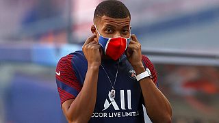Kylian Mbappe wearing his mask before a Paris St Germain match