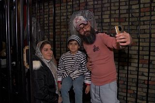 Customers taking a selfie at the restaurant-jail