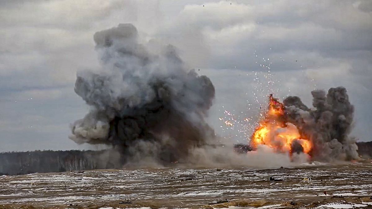 In this photo taken from video and released by Moscow on Feb. 4, 2022, flame and smoke rise during joint Russia-Belarus military drills at Brestsky firing range, Belarus