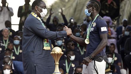 The victorious Senegalese soccer team received by President Macky Sall