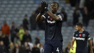 West Ham's Kurt Zouma celebrates at the end of the English Premier League soccer match between Aston Villa and West Ham United at Villa Park in Birmingham