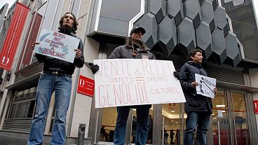 A protest against the sale of native artefacts outiside the Drouot's auction house in 2014