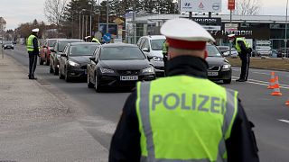 Police check people who want to leave Wiener Neustadt, Austria, March 13, 2021.