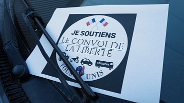 This picture shows a poster reading "I support the freedom convoy, all united" (convoi de la liberte) in Nice, southeastern France, on february 9, 2022.
