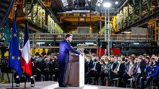 French President Emmanuel Macron delivers a speech at the GE Steam Power System main production site for its nuclear turbine systems in Belfort, eastern France.