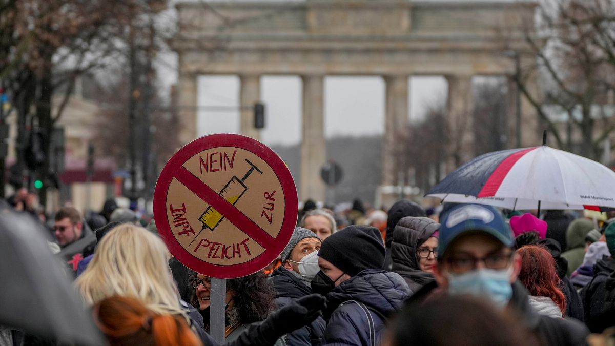A sign that says "no to compulsory vaccination" is seen at a protest in front of the Brandenburg Gate in Berlin, Germany, on January 26.