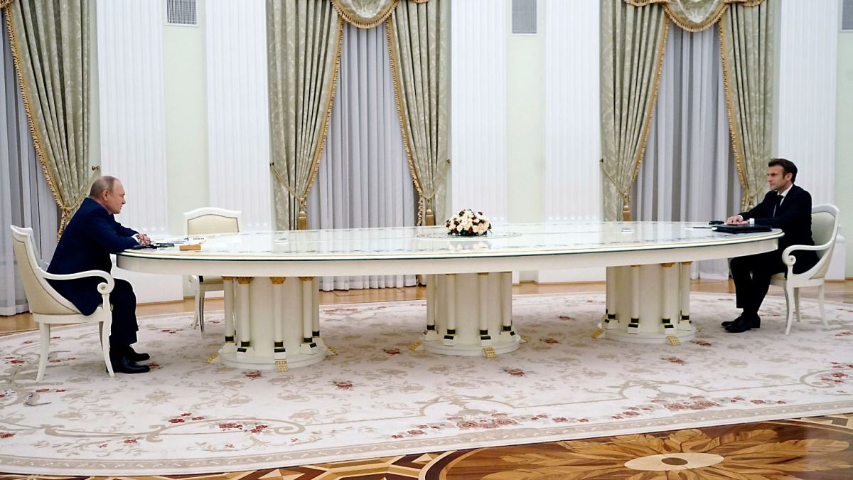 Russian President Vladimir Putin and French President Emmanuel Macron were separated by a six-metre long table.