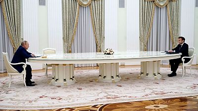 Russian President Vladimir Putin and French President Emmanuel Macron were separated by a six-metre long table. Russian President Vladimir Putin and French President Emmanuel Macron were separated by a six-metre long table.