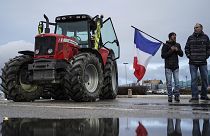 Protesters prepare to leave for a convoy in Lyon, central France, Friday, 11 February, 2022
