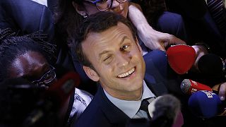 hen Independent centrist presidential candidate Emmanuel Macron smiles to the media after a meeting with young people of Paris suburbs in 2017