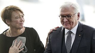 Reelected German President Frank-Walter Steinmeier is congratulated by his wife Elke Buedenbender