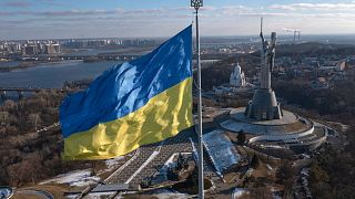  Ukraine's national flag waves above the capital