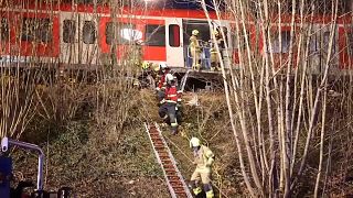  Police and firefighters at the scene of the crash in southwestern Germany.