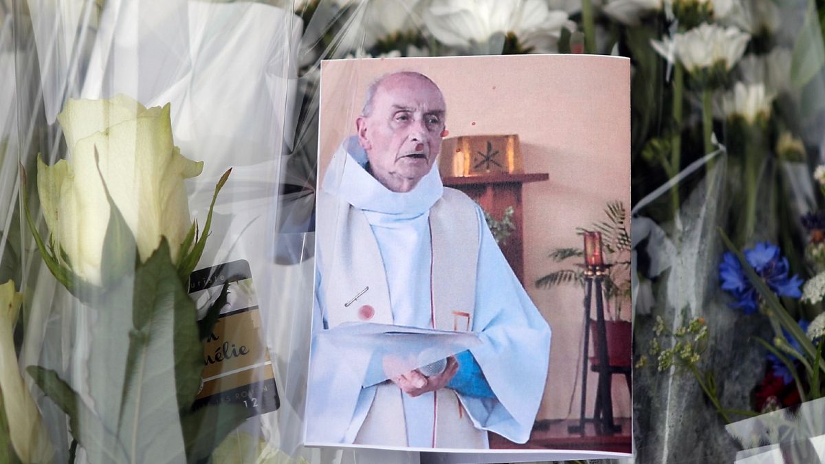 A picture of late Father Jacques Hamel at the makeshift memorial  in Saint-Etienne-du-Rouvray, Normandy, France, July 27, 2016. 