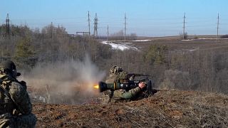 Ukrainian soldiers firing with Light Anti-Tank Weapon (NLAW) missile systems.