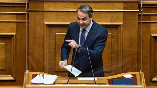 Greek Prime Minister Kyriakos Mitsotakis speaks during a parliamentary session in Athens, on Feb. 15, 2022.