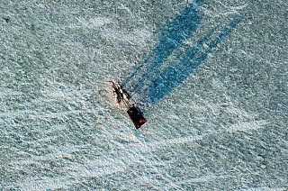 Orhan Goller takes tourists for a ride on the frozen Lake Çıldır in Turkey