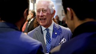 Britain's Prince Charles reacts as he attends an advent service held at Holy Trinity Brompton church, in London, Thursday, Dec. 9, 2021. 