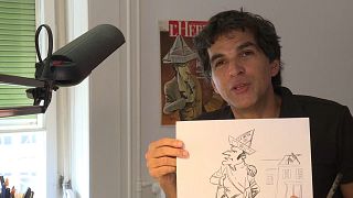 Патрик Шаппатт c карикатурой на Эммануэля Макрона. Морж, сентябрь 2018 года